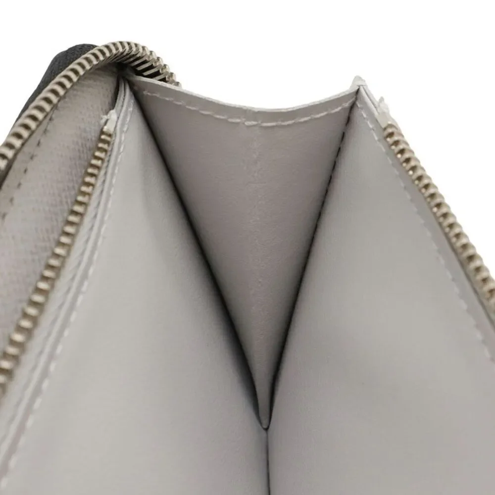 Louis Vuitton Zippy Wallet Vertical Monogram Taiga Long Wallet